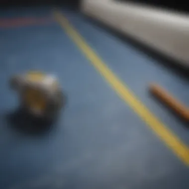 Essential Tools for Accurate Measurement Tape measure and pencil on blueprint