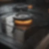 Close-up of a clean glass stove top reflecting light