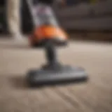 Modern carpet cleaner in action on a plush carpet