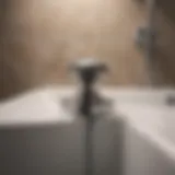 A clogged bathtub drain with standing water