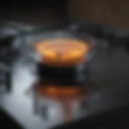 Close-up of a pristine glass stove top reflecting light