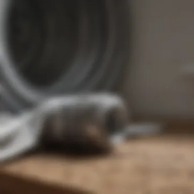Identifying Lint Buildup in Dryer Vent Dryer vent pipe with lint buildup