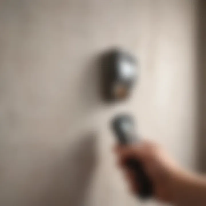 Illustration of a stud finder tool in action on a plaster wall