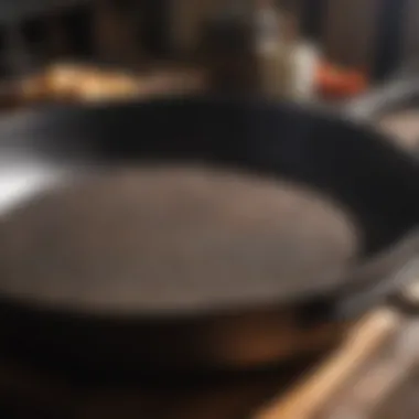 Close-up of seasoned iron skillet emphasizing the importance of seasoning maintenance