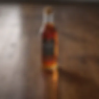 Bottle of vinegar with a wooden floor background